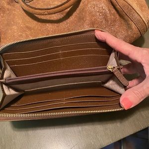 Michael Kors distressed ostrich skin purse and wallet.